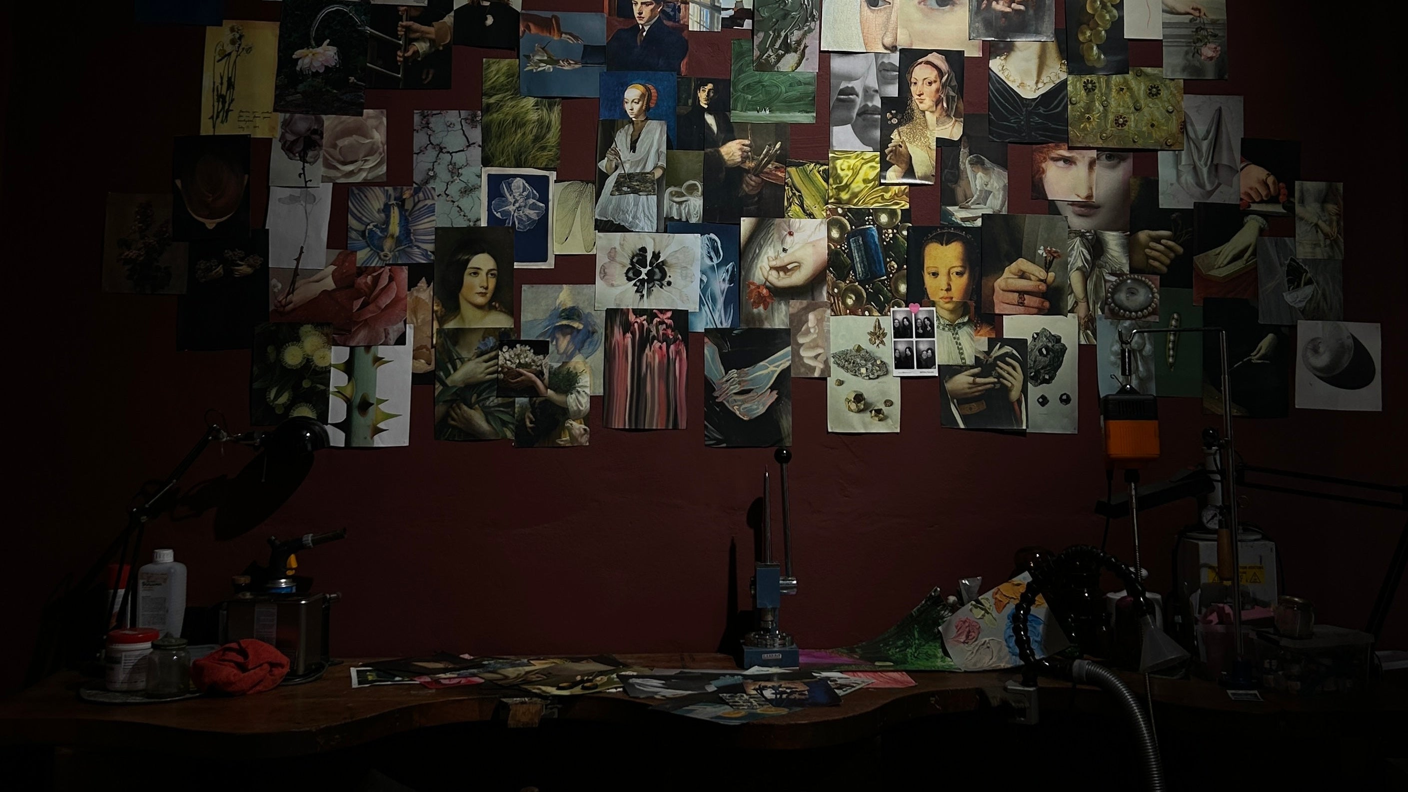 Collage of various images on a dark wall