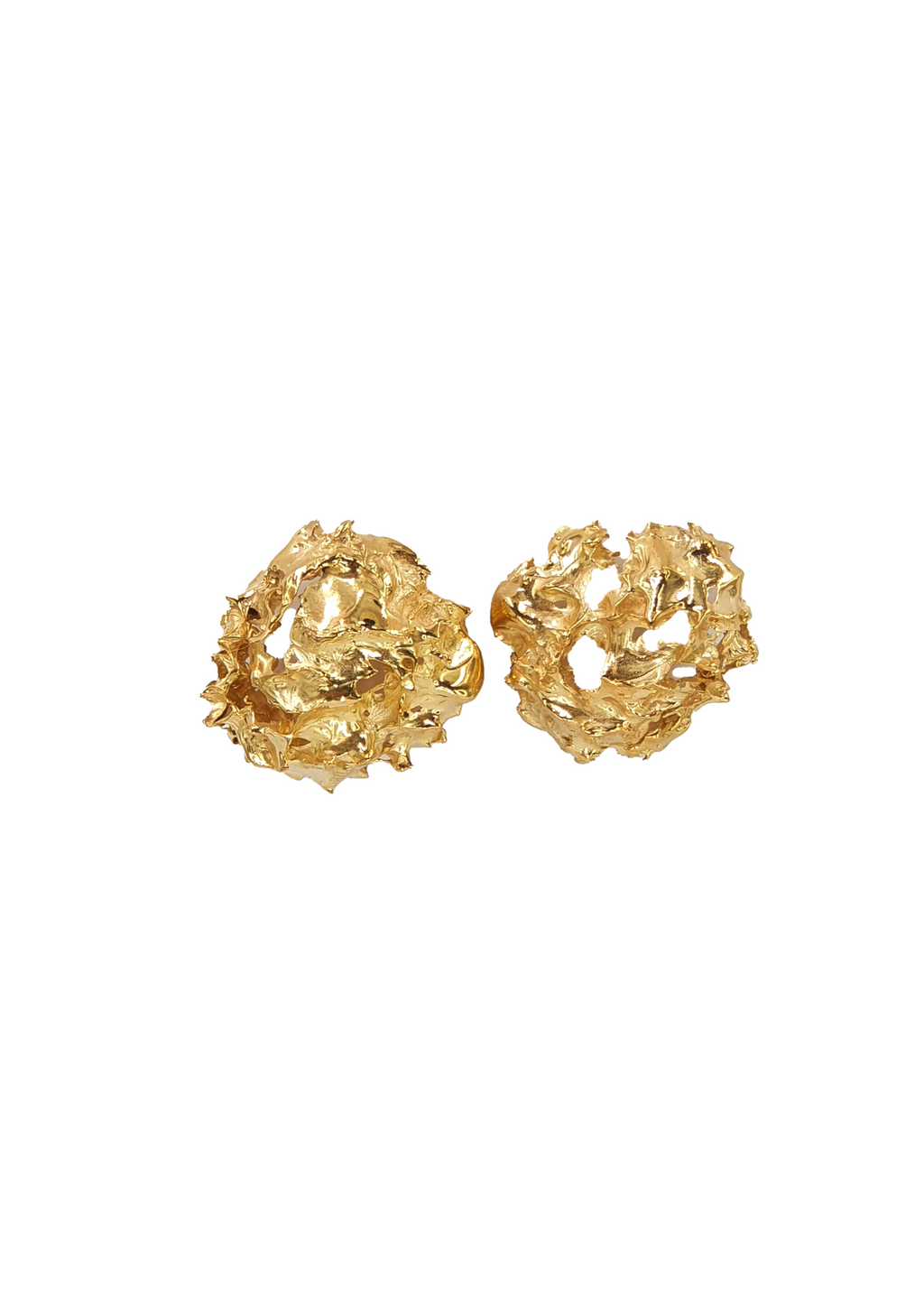 Pair of handcrafted gold earrings on a white background