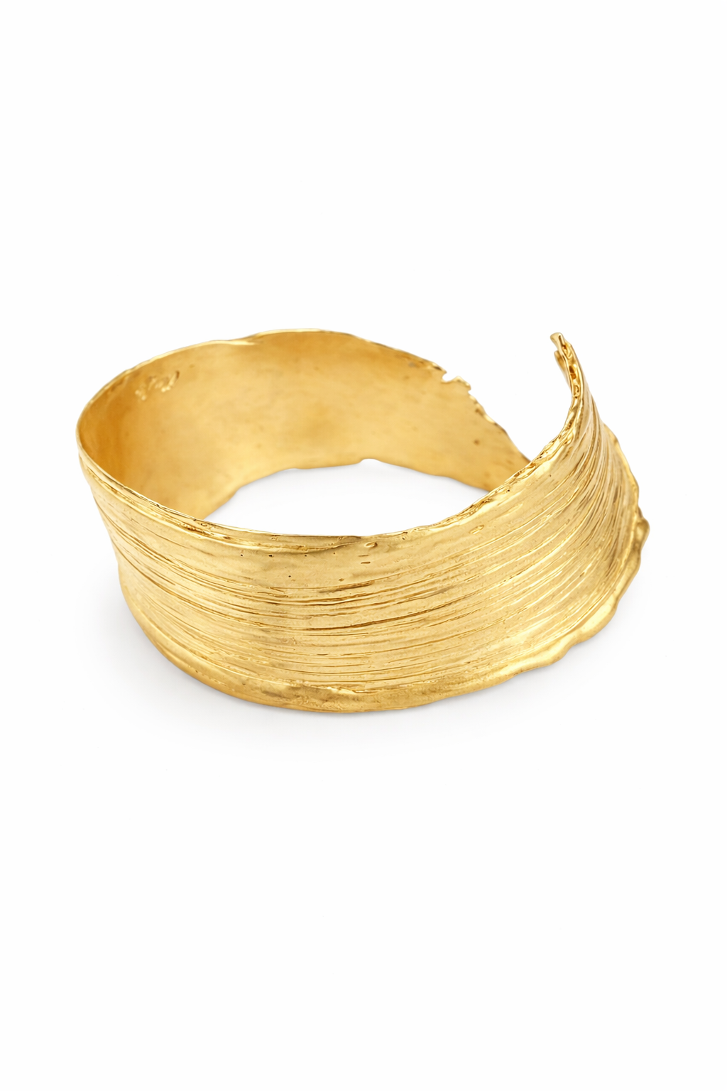 handcrafted Gold bracelet on a white background