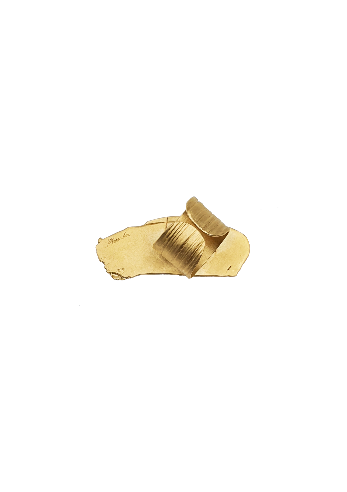 Handcrafted gold ring, the underside where the logo is visible on a white background