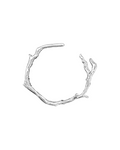 Handcrafted Silver branch-like jewelry piece on a white background
