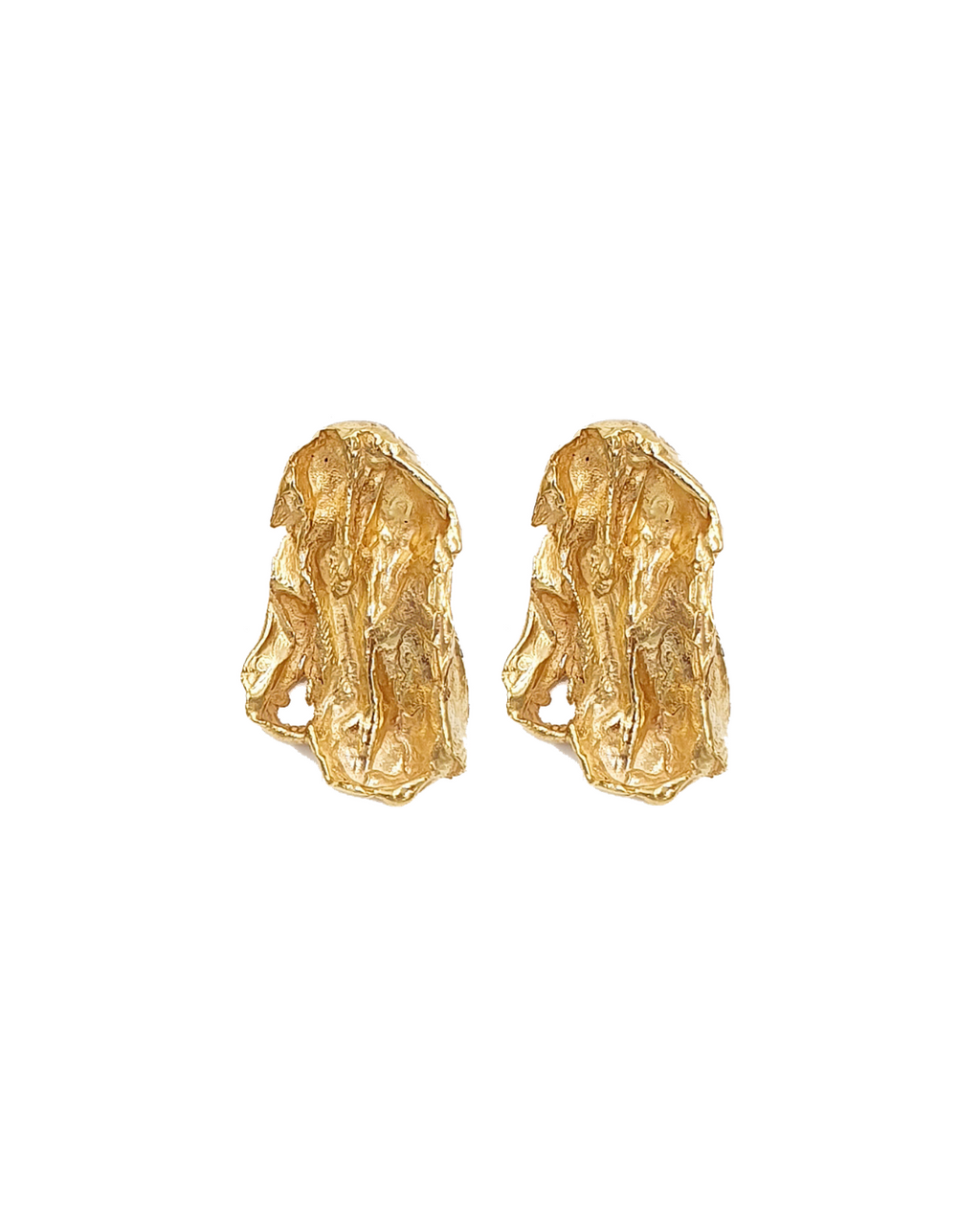 Pair of handcrafted gold earrings on a white background