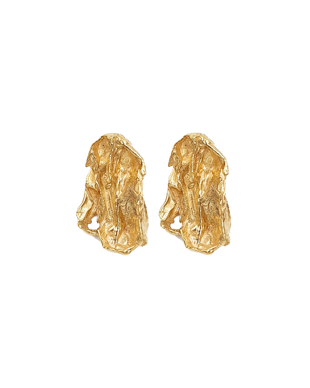 Pair of handcrafted gold earrings on a white background